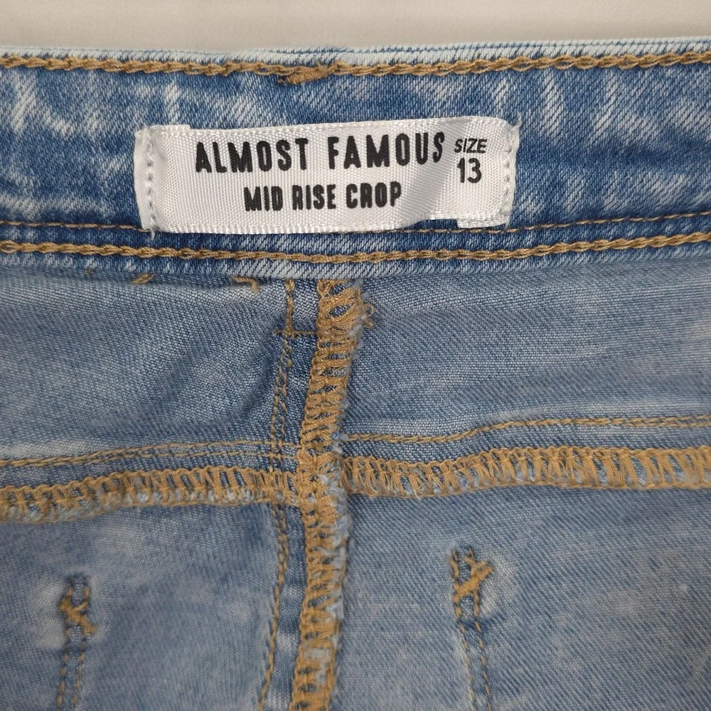 Almost Famous Mid Rise Crop Jeans Jr 13 Light Wash Distressed Raw Hem Zip Ankles